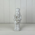 Glazed Ceramic Nutcracker Ornament With Textured Detail