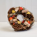 Autumn centrepiece with leaves and fruit
