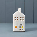 Ceramic house tealight with reactive glaze