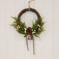 Twig Wreath With white Berry, Pinecones with Bells and Bow Detail Medium