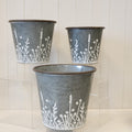 Set of Three Rustic metal planters with Meadow design